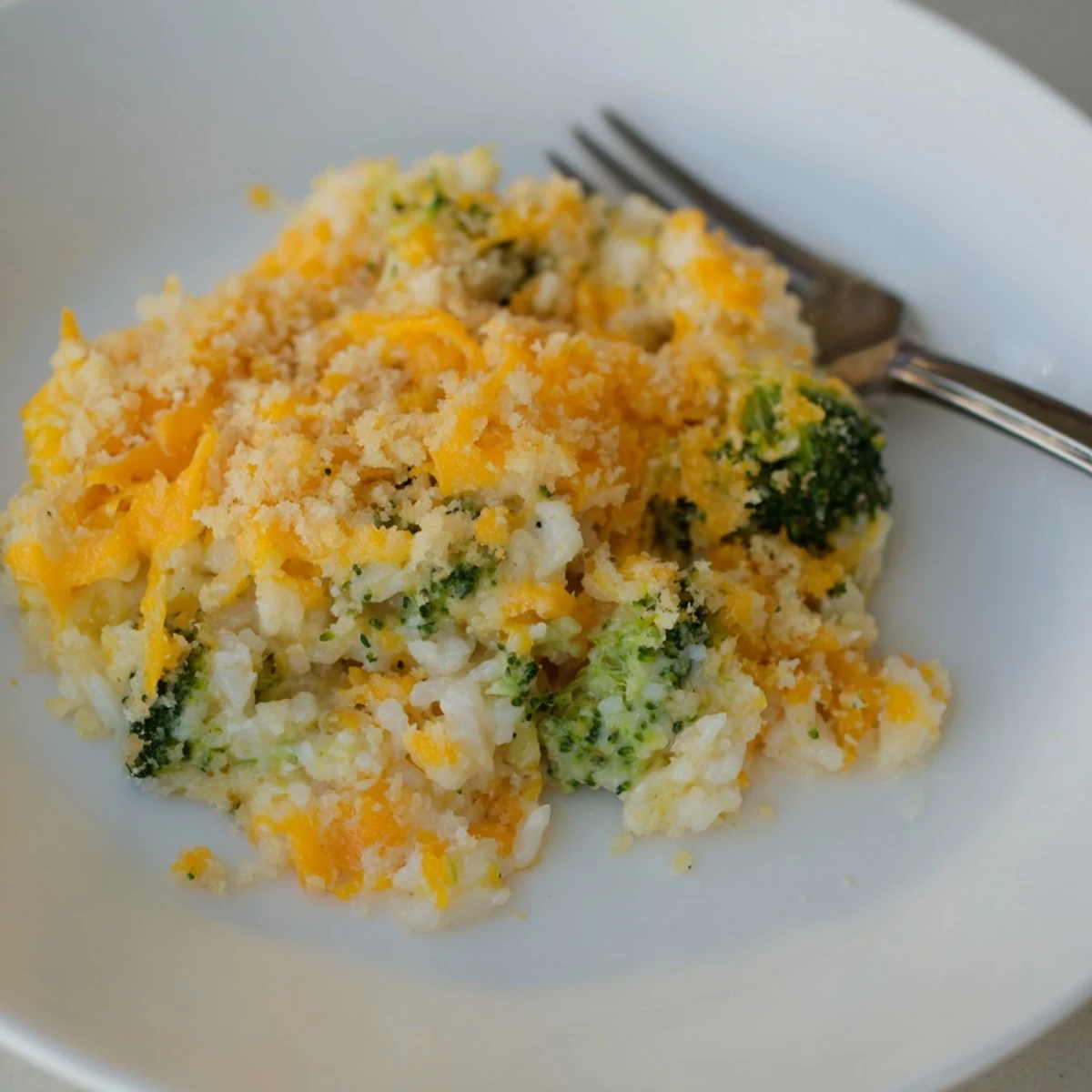 A golden-baked Cheesy Broccoli and Rice Casserole perfect for family meals and gatherings.  