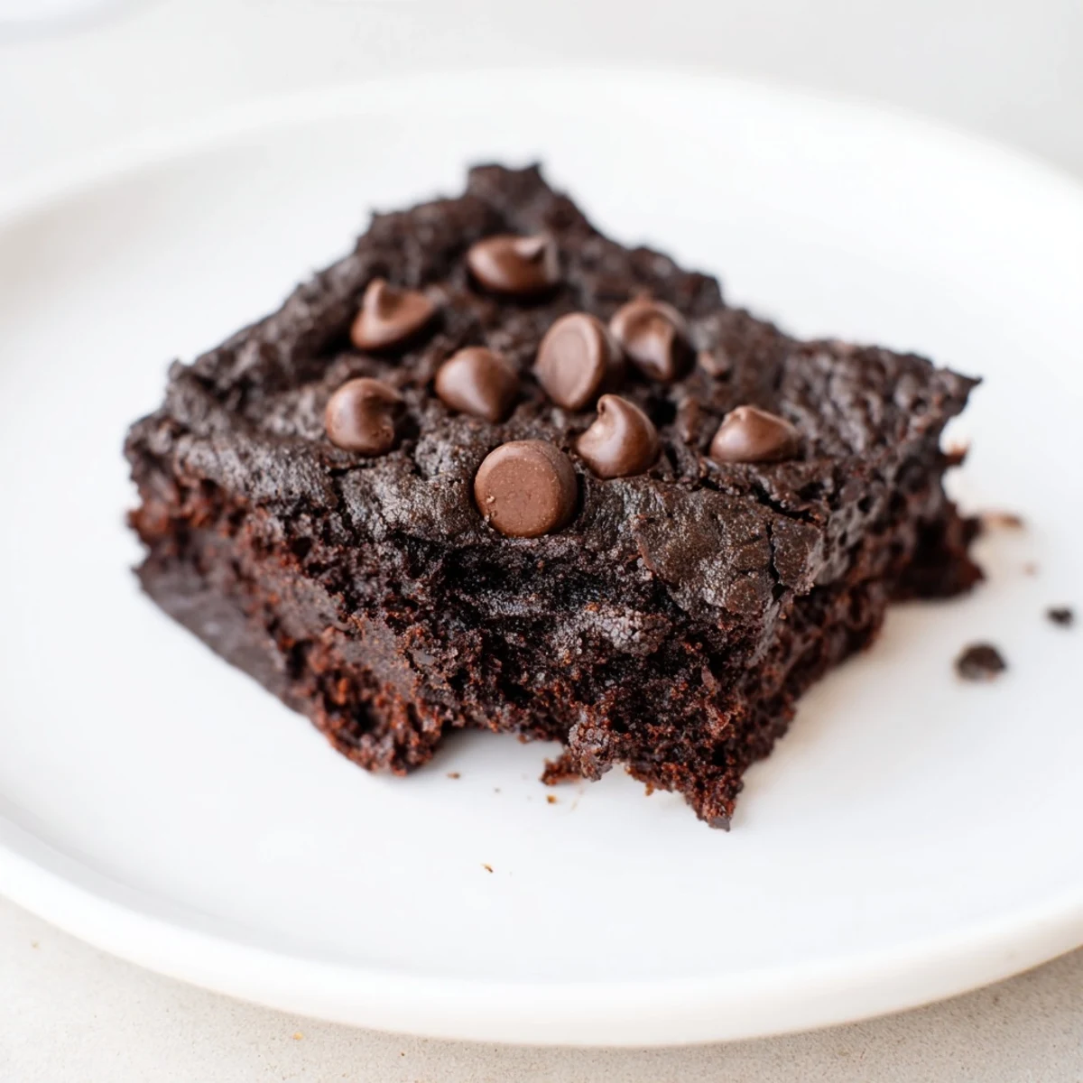 A close-up shot of rich and moist Black Bean Brownies, perfect for satisfying your chocolate cravings.