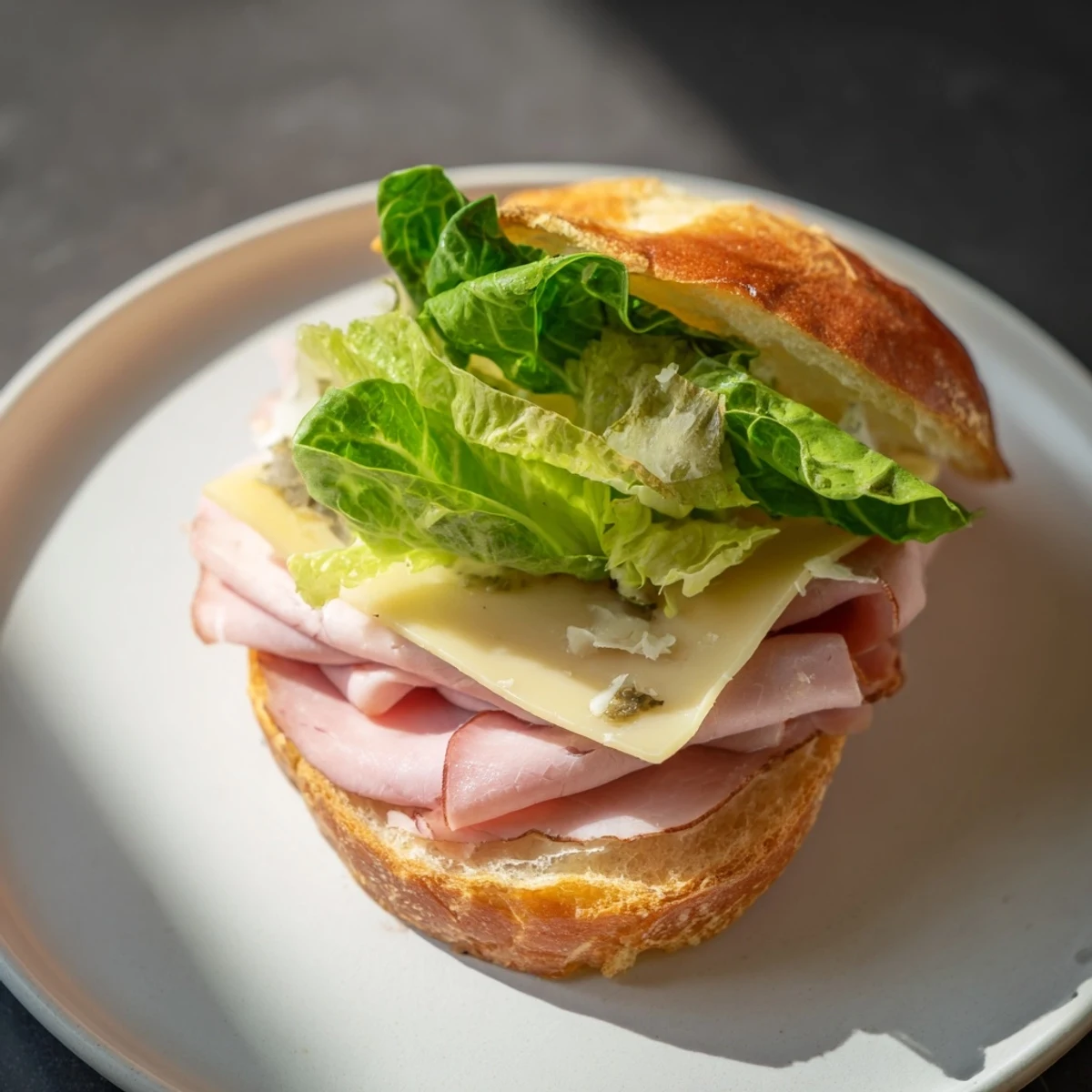 Vibrant Festin du Château Royal Sandwiches, layered with ham, cheese, and fresh greens, ready to eat.