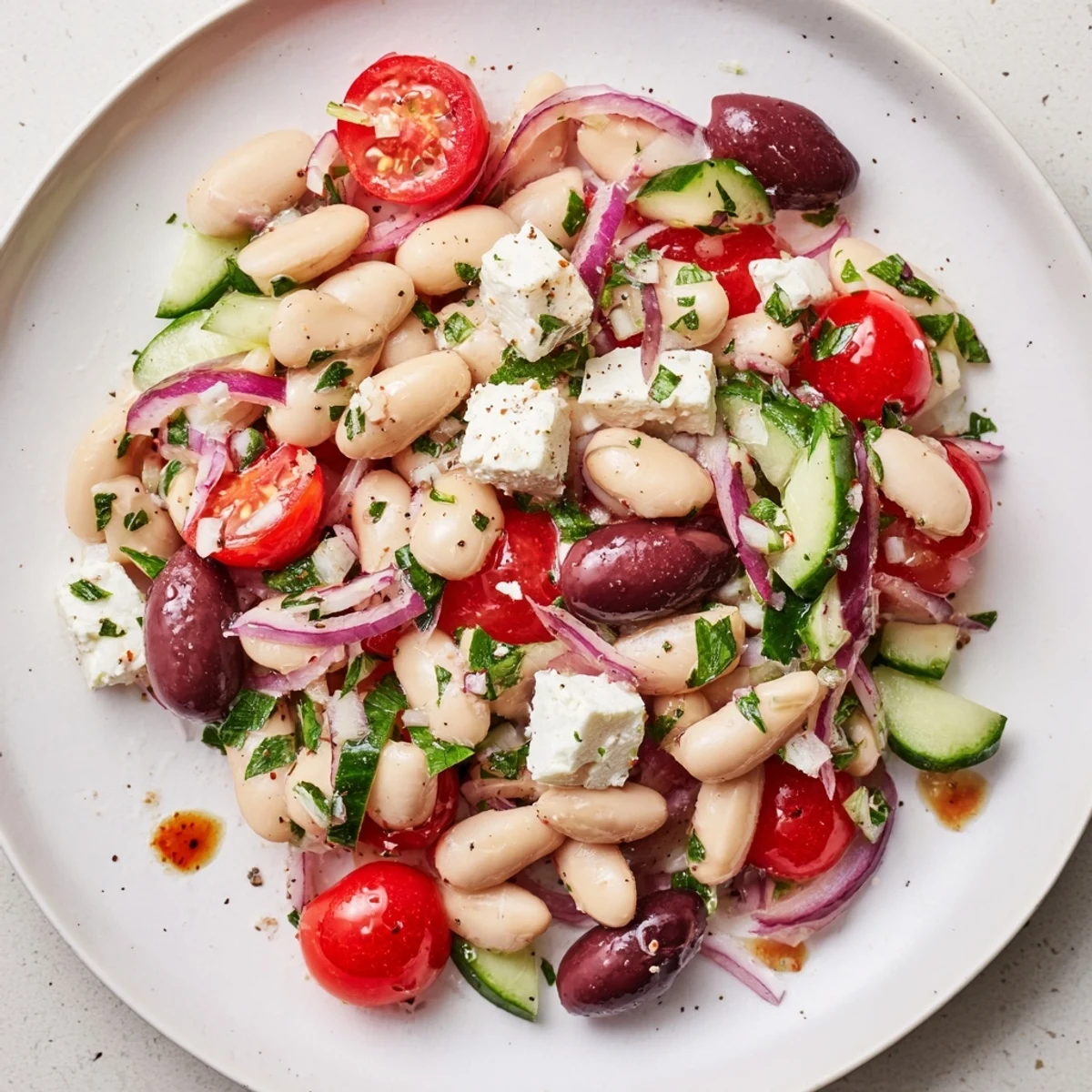 A refreshing Mediterranean-style White Bean Salad, perfect for a light vegetarian lunch option.