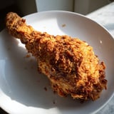 Close up shot of crispy KFC chicken, perfect for a family feast of fried goodness.