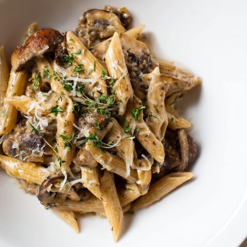 Creamy Mushroom Pasta simmered with garlic and fresh thyme for a rich taste.  