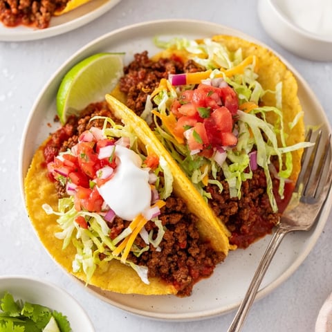 Juicy beef tacos with fresh salsa, wrapped in warm tortillas for delicious flavor.  