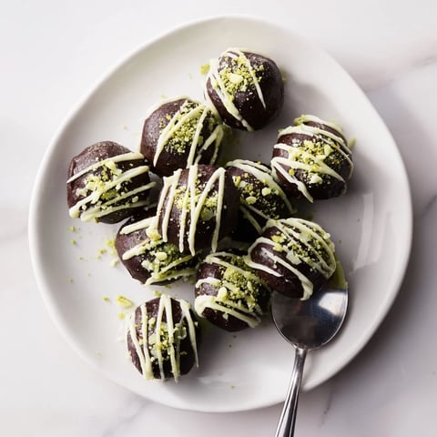 Bright green Matcha Dark Chocolate Peppermint Truffles, rolled in matcha, are a perfect holiday dessert.