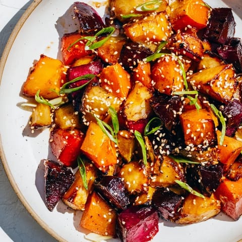 Vibrant image of miso roasted winter vegetables showcasing their savory, glazed appearance, ready to serve.