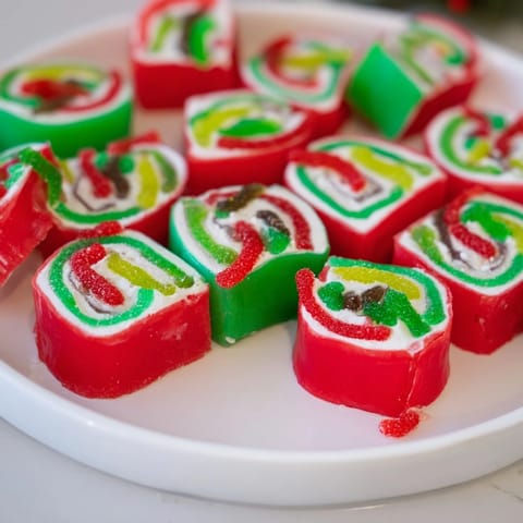 These sweet and simple Easy Christmas Fruit Rollup Sushi rolls are ready in minutes for a holiday treat.