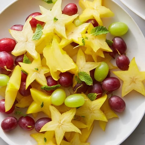 Sliced Starfruit and Grapes