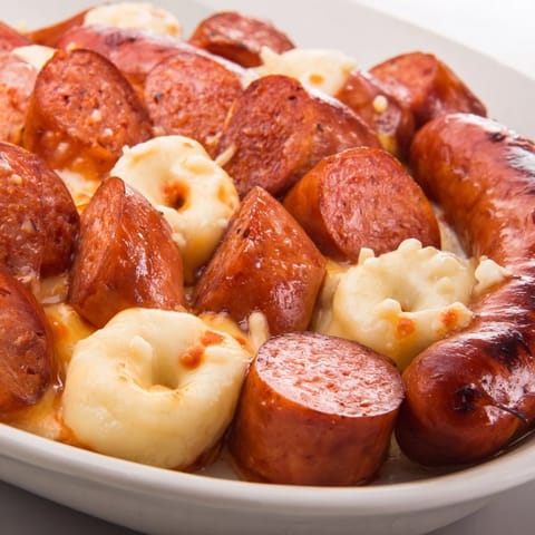 Golden brown Chicken and Sausage Bisquick Balls, perfect for a party, fresh from the oven.