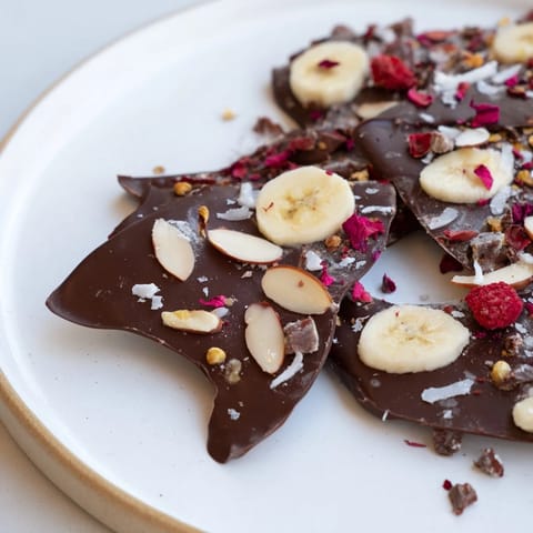 Close-up of Chocolate Banana Bark, showing a cross-section with creamy banana and rich chocolate.