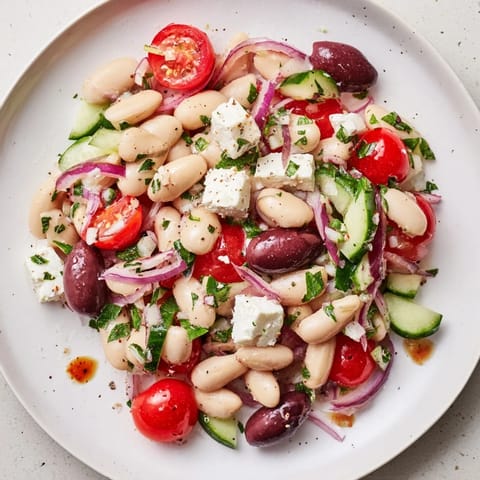 A refreshing Mediterranean-style White Bean Salad, perfect for a light vegetarian lunch option.