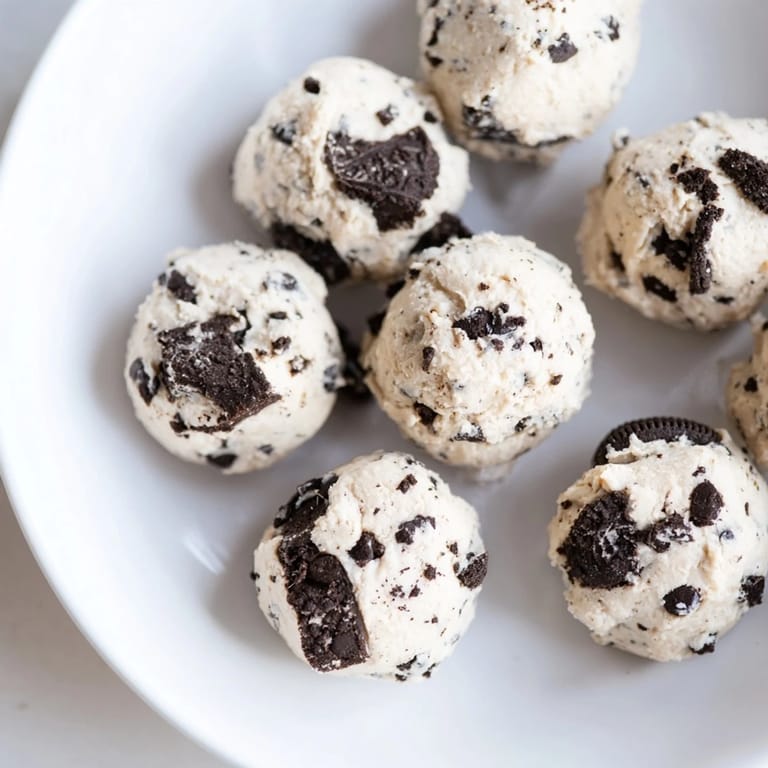 Imagine a vibrant photo of Cream Cheese Oreo Protein Balls: chewy, sweet, and ready in minutes!