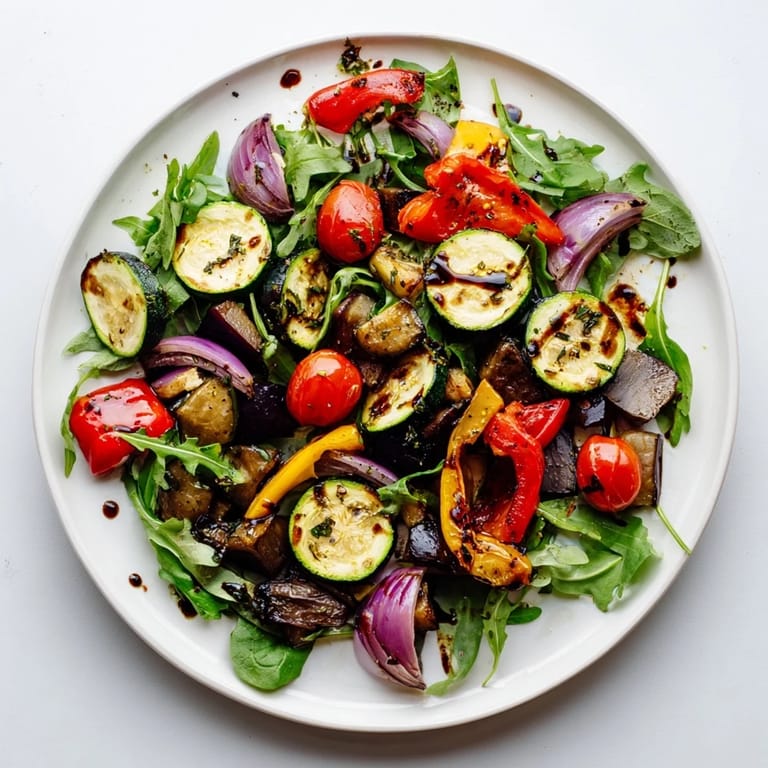 A close-up view shows a delicious Roasted Vegetable Salad, perfect for a fresh summer meal idea.